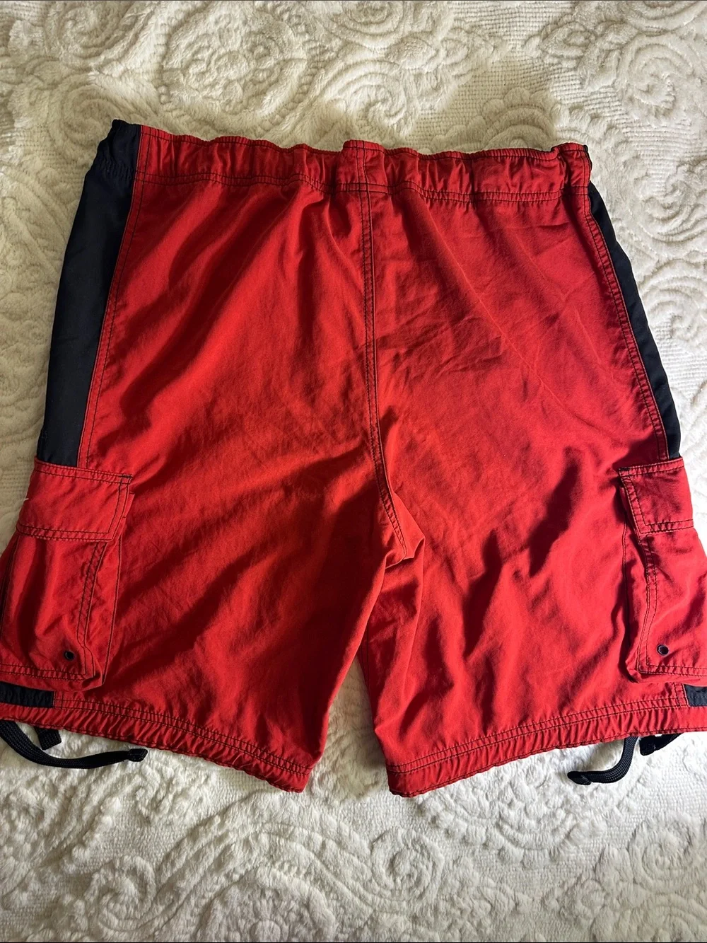 Nike Red Swim Shorts with Black trim and pockets